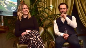 Eyes off the King! Julia Stiles and George Blagden share a moment.